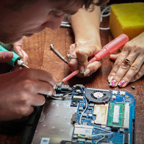 A Restarter fixing a device at one of our events